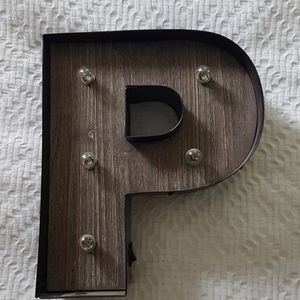 Marquee letter P